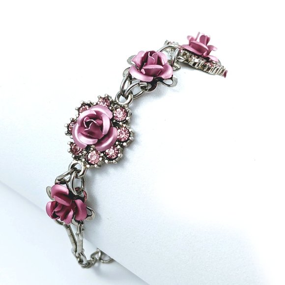 Avon Jewelry - Avon Pink Metal Roses Bracelet